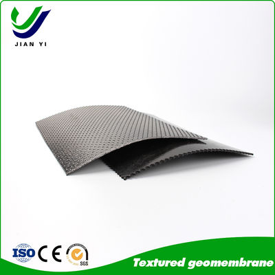 Geomembrane kết cấu: Nơi nắm bắt gặp không thấm trên sườn dốc nhất; Sub-headline: Defy Gravity. Lock Barriers in Place. Engineer Absolute Stability.